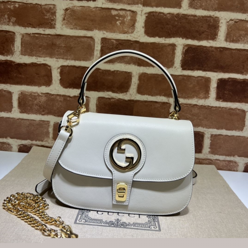 G*u*i top handle bags